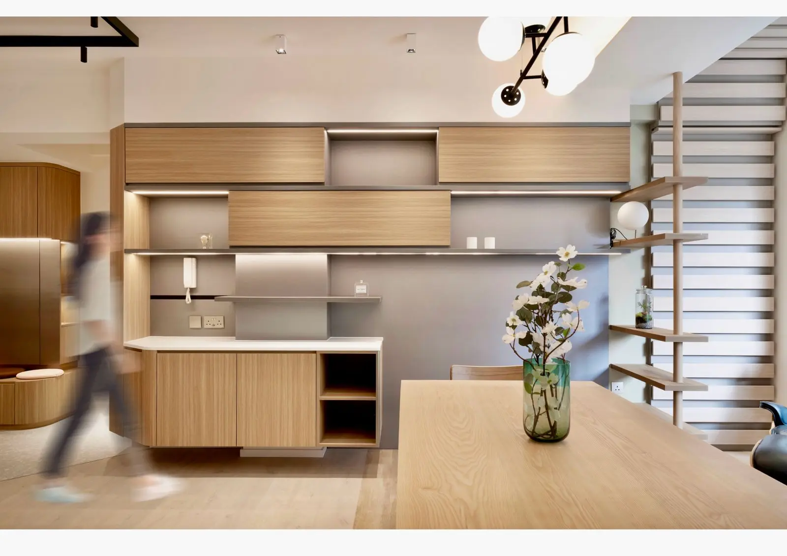 Coffee bar and open shelving beside the dining table