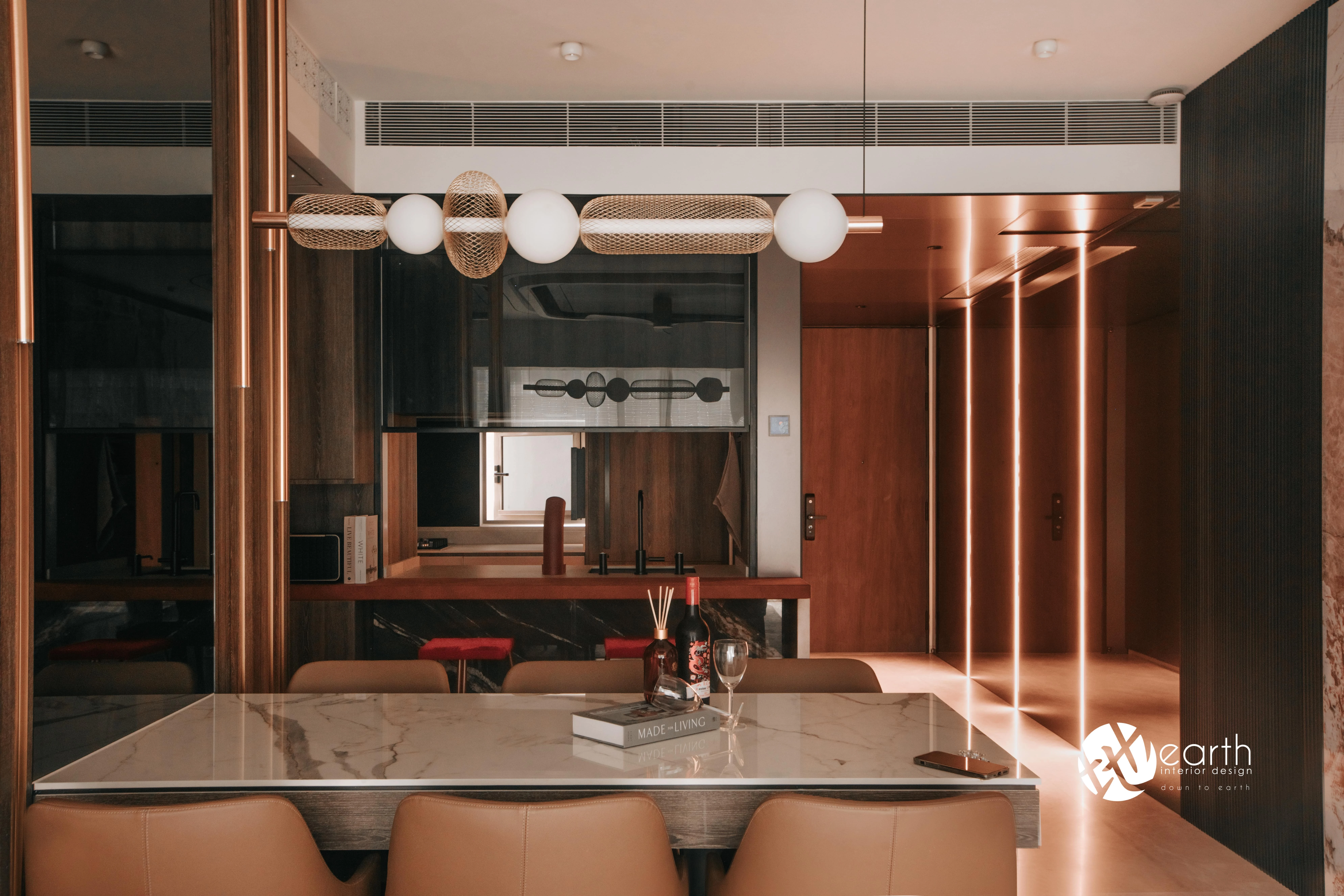 Dining area with dark tinted mirror at Harbour Lux