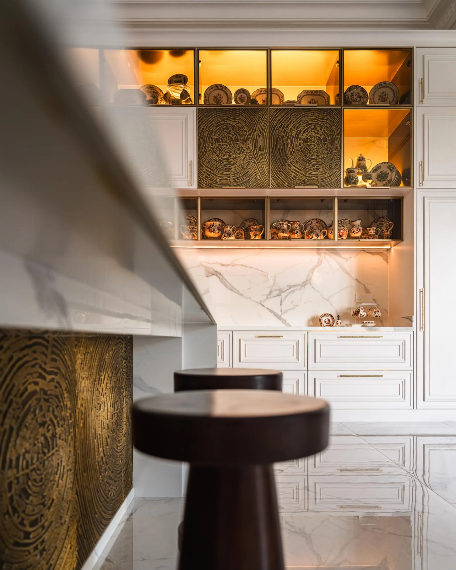 Embossed brass panels in the pale interior