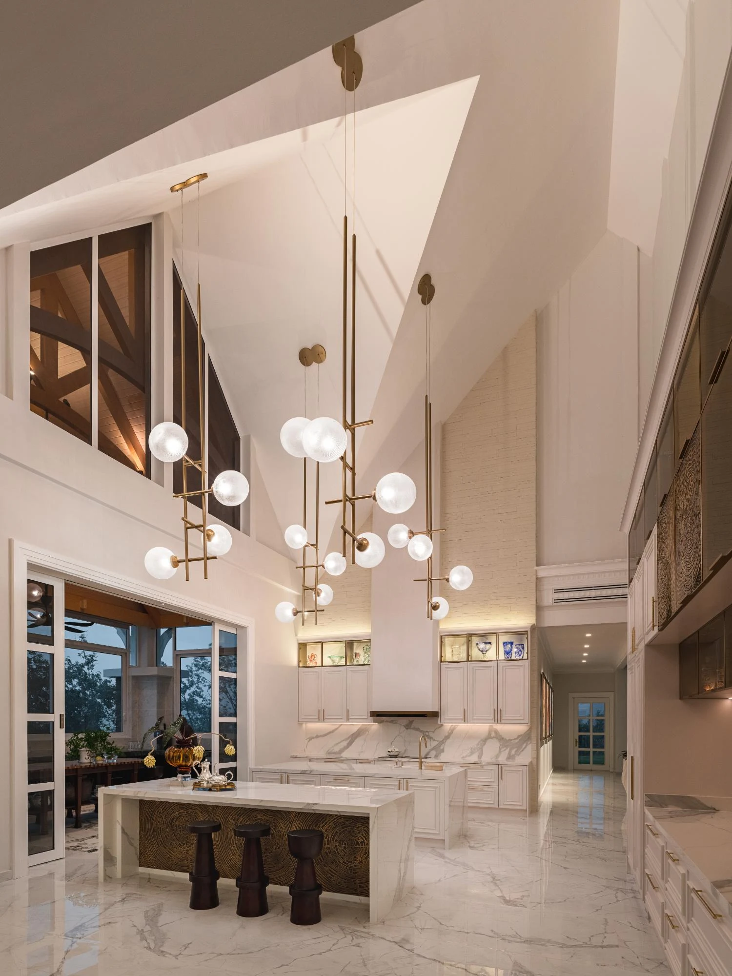 Kitchen with timber arch beams visible above