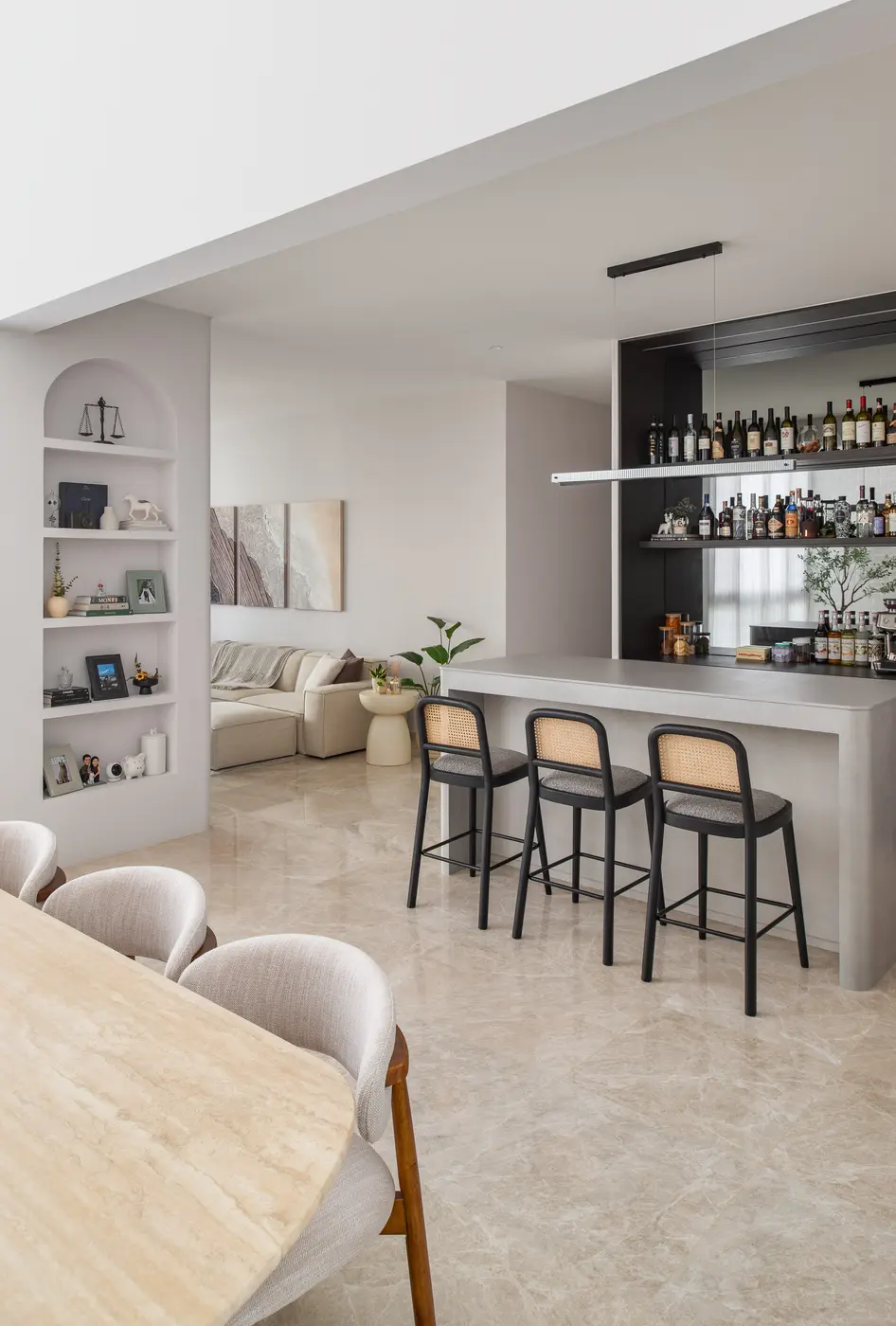 Bar and kitchen area opening to living