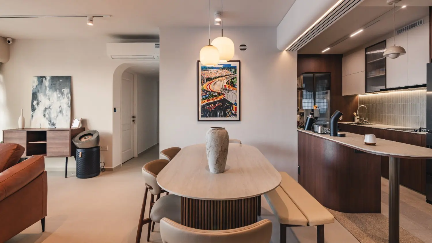 Dining area beside the curved kitchen peninsula