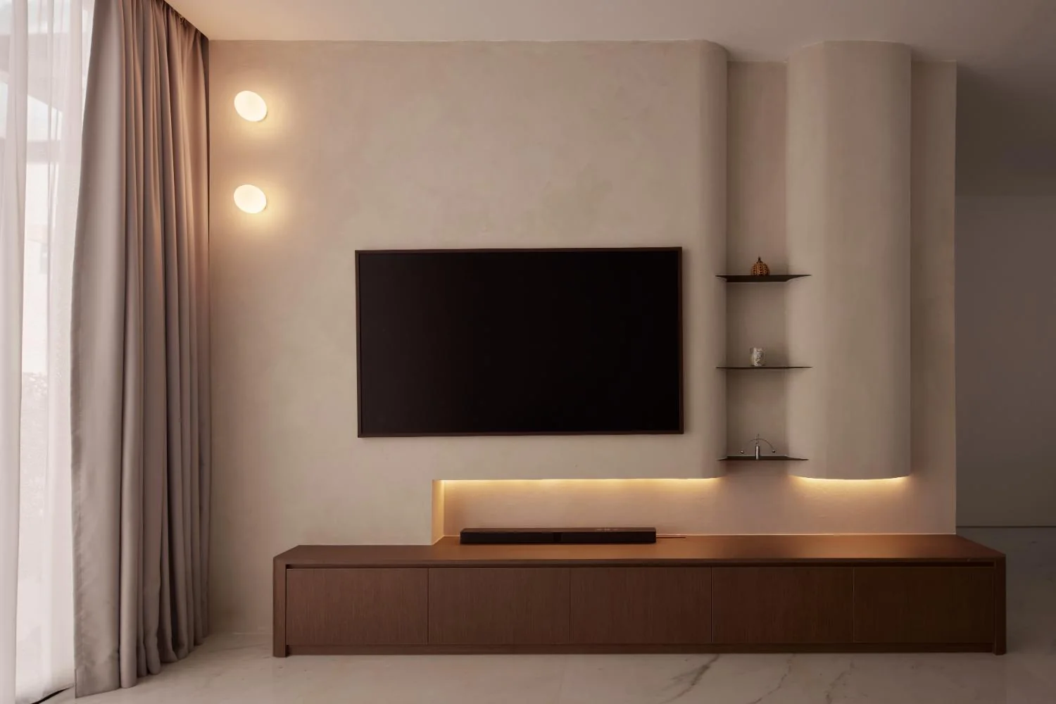 Television wall with timber console and floating shelves