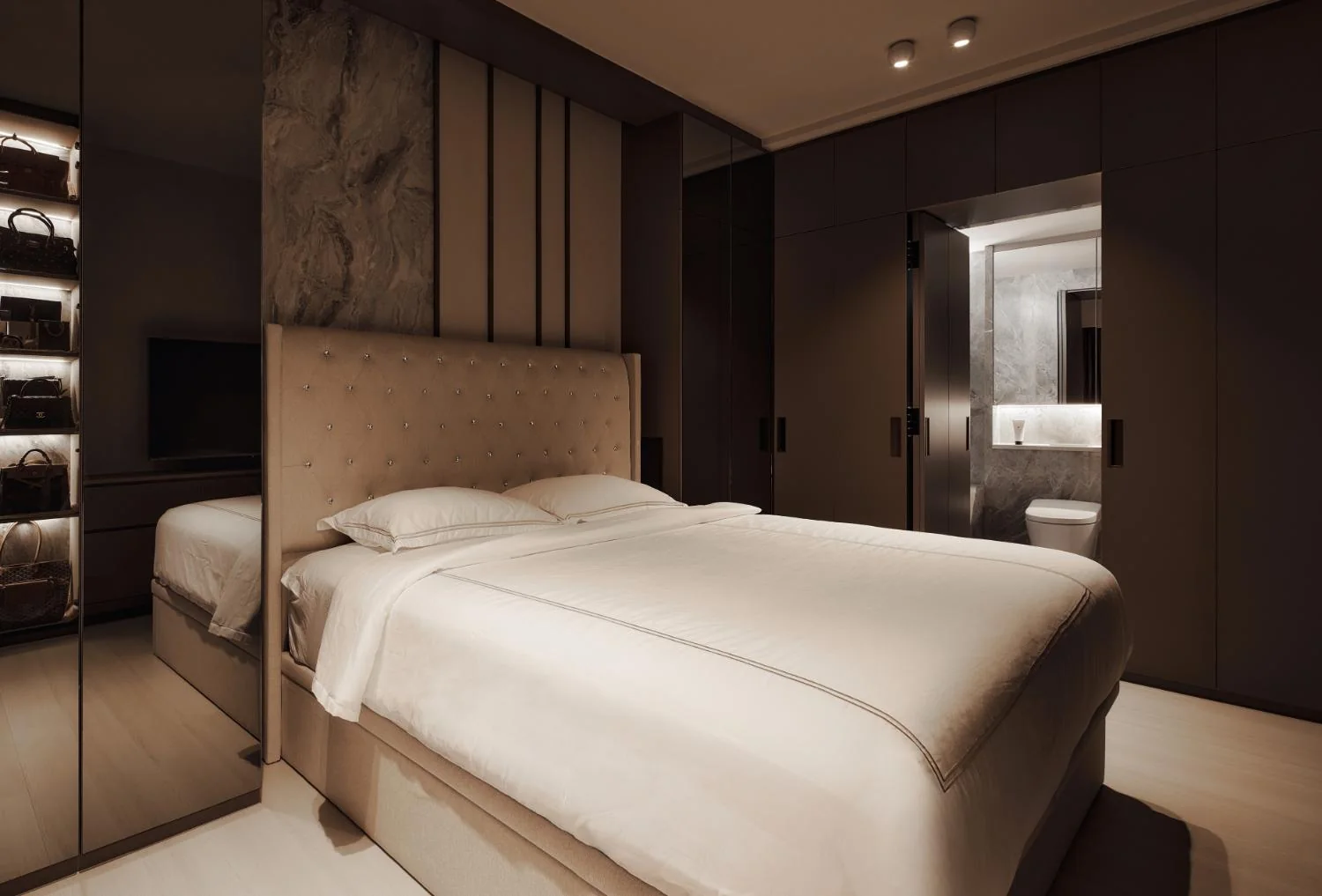 Warm view of the master bedroom at Esparina Residences