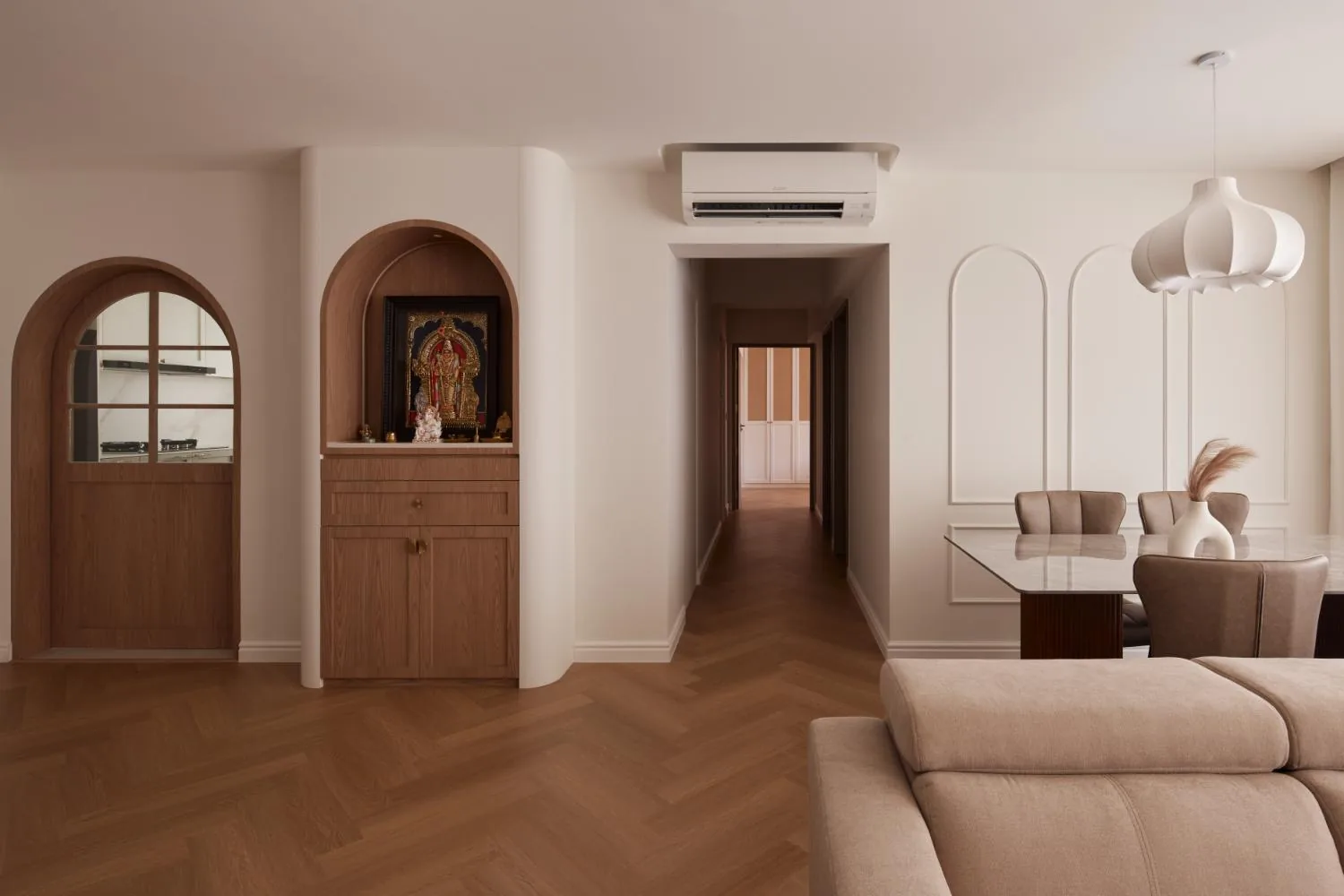 Bespoke altar and arched doorway beside the dining area