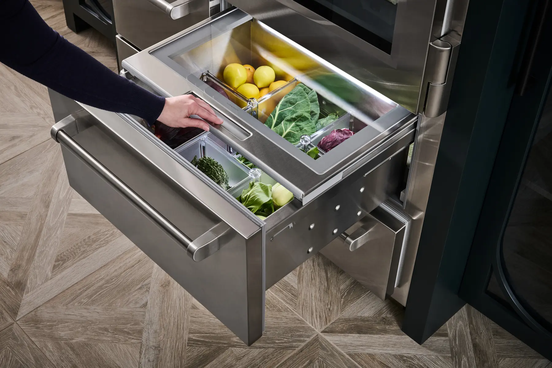 Sub-Zero PRO 48 produce drawer organised with fresh fruit and vegetables